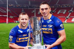Kevin Sinfield, right, seen with Rob Burrow at Old Trafford following Leeds Rhinos' Grand Final win in 2011. Picture by Vaughn Ridley/SWpix.com.