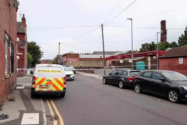 The scene in Florence Street from the Compton Road cordon in Harehills, Leeds. Picture: National World