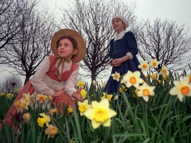 Kippax's Gibson Lane Primary School pupils, Rachel Milburn (left) and Francesca Kelly rehearse among the daffodils outside West Yorkshire Playhouse for 'The Herbal Bed'. Both played William Shakespeare's granddaughter.