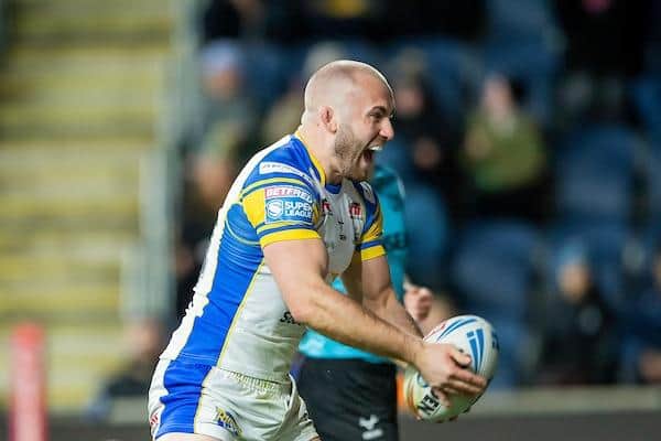 Jarrod O'Connor celebrates his try which gave Leeds Rhinos a 24-12 lead against Huddersfield Giants, but they couldn't hold on. Picture by Allan McKenzie/SWpix.com.