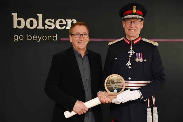 LL Ed Anderson presents the King’s Award scroll to Ashley Bolser