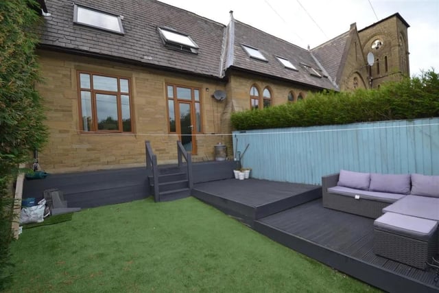 This two-bedroom home converted from a school is for sale at £209,950.