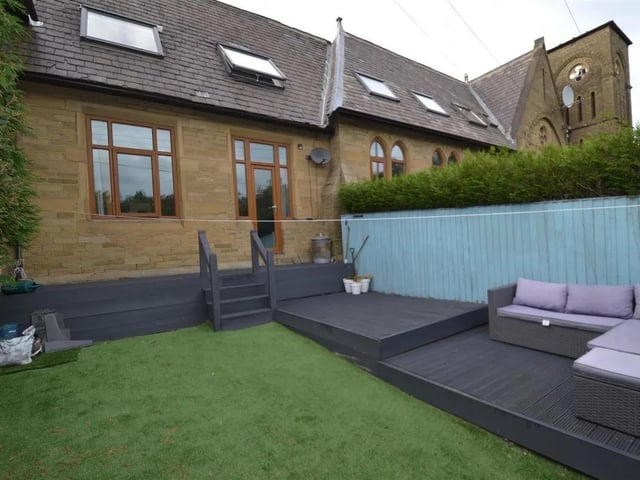 This two-bedroom home converted from a school is for sale at £209,950.