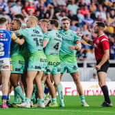 Referee Jack Smith watches as things get heated between Leeds Rhinos and St Helens. Picture by Alex Whitehead/SWpix.com.