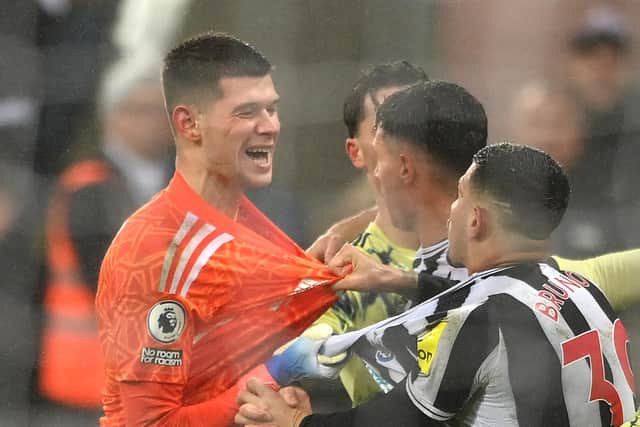 NEWCASTLE UPON TYNE, ENGLAND - DECEMBER 31: Leeds goalkeeper Illan Meslier has words with Newcastle player Bruno Guimara during the Premier League match between Newcastle United and Leeds United at St. James Park on December 31, 2022 in Newcastle upon Tyne, England. (Photo by Stu Forster/Getty Images)