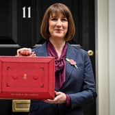 Chancellor of the Exchequer Rachel Reeves poses with the red Budget Box as she leaves 11 Downing Street last autumn; what will she have in store today? (Picture: Justin Tallis/AFP)