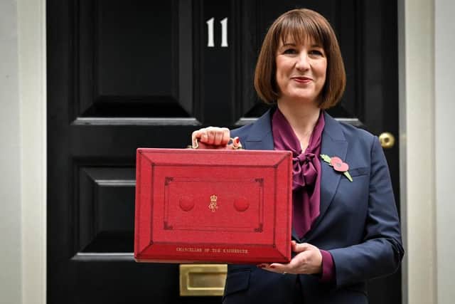Chancellor of the Exchequer Rachel Reeves poses with the red Budget Box as she leaves 11 Downing Street last autumn; what will she have in store today? (Picture: Justin Tallis/AFP)