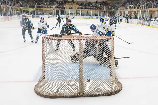GETTING AHEAD: Matt Bissonnette (right) beats Jordan Hedley to make it 2-0 to Leeds Knights against Milton Keynes on Sunday. Picture: Jacob Lowe/Knights Media.