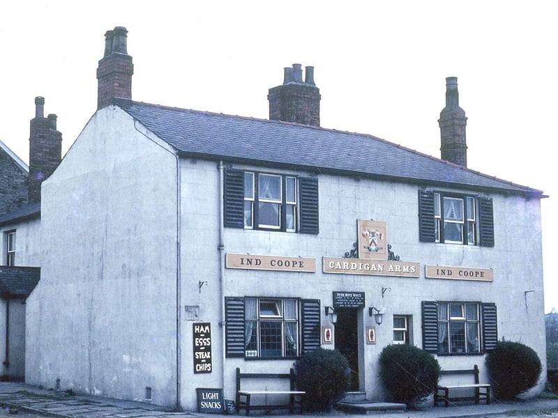 The Cardigan Arms on Dewsbury Road pictured in May 1963. It was named after the Lord of the Manor, the Earl of Cardigan and at this time the ale was supplied by Ind Coope. Signs advertise 'Light Snacks' and meals of 'Ham and Eggs' and Steak and Chips'. It was demolished in 1972.