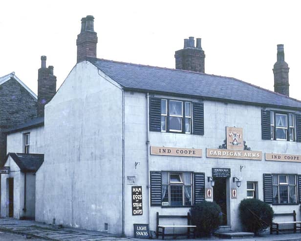 The Cardigan Arms on Dewsbury Road pictured in May 1963. It was named after the Lord of the Manor, the Earl of Cardigan and at this time the ale was supplied by Ind Coope. Signs advertise 'Light Snacks' and meals of 'Ham and Eggs' and Steak and Chips'. It was demolished in 1972.