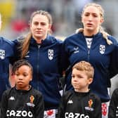 Caitlin Beevers, right, lines up during the national anthem before England's win over Brazil, alongside  Emily Rudge and Fran Goldthorp. Picture by Will Palmer/SWpix.com.