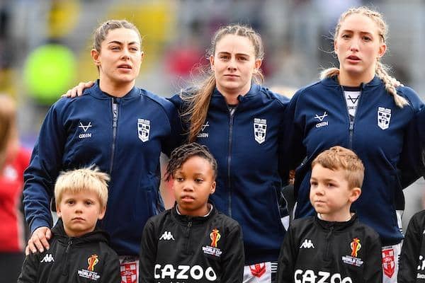 Caitlin Beevers, right, lines up during the national anthem before England's win over Brazil, alongside  Emily Rudge and Fran Goldthorp. Picture by Will Palmer/SWpix.com.