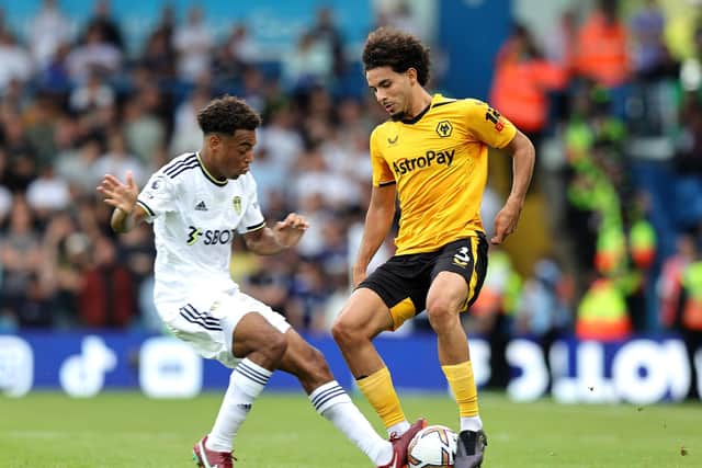 LEEDS, ENGLAND - AUGUST 06: Rayan Ait-Nouri of Wolverhampton Wanderers is tackled by Tyler Adams of Leeds United during the Premier League match between Leeds United and Wolverhampton Wanderers at Elland Road on August 06, 2022 in Leeds, England. (Photo by David Rogers/Getty Images)