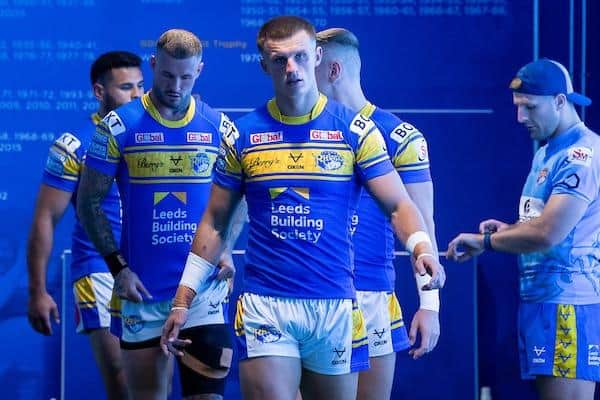 Ash Handley leads Rhinos out to play Wigan at Headingley last July. Picture by Allan McKenzie/SWpix.com.