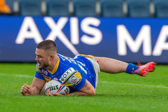 James Bentley scores for Rhinos against Wakefield last season. Picture by Bruce Rollinson.