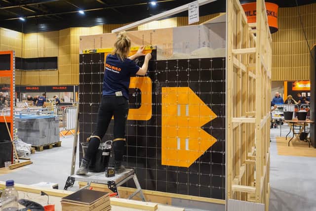 Holly Taylor Whitehead in the Wall & Floor Tiling final of SkillBuild 2024.