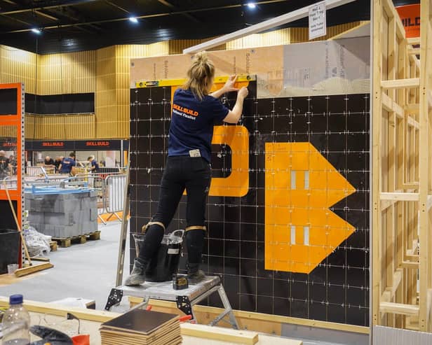 Holly Taylor Whitehead in the Wall & Floor Tiling final of SkillBuild 2024.