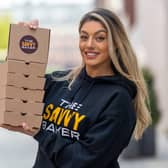 Savannah Roqaa, 25, who owns The Savvy Baker, which has opened a brand new café offering enviable brownies and cookies at Leeds' White Rose shopping centre. Photo: James Hardisty.