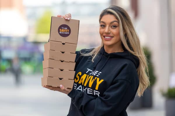 Savannah Roqaa, 25, who owns The Savvy Baker, which has opened a brand new café offering enviable brownies and cookies at Leeds' White Rose shopping centre. Photo: James Hardisty.