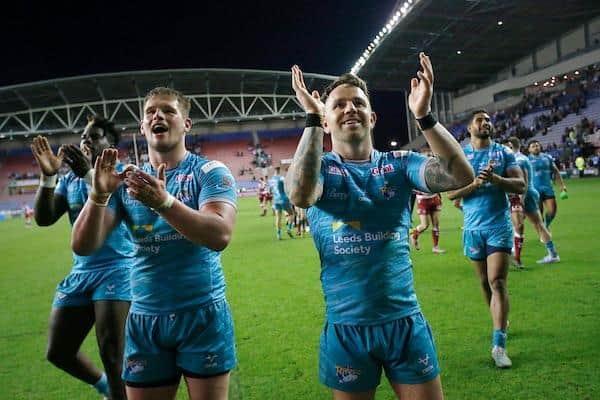 Justin Sangare, Tom Holroyd, Richie Myler and Nene Macdonald celebrate Rhinos' win at Wigan. Picture by Ed Sykes/SWpix.com.