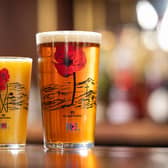 Limited-edition poppy pint glasses designed by Colin Waite