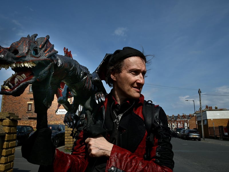 Taking his pet for a walk in Whitby