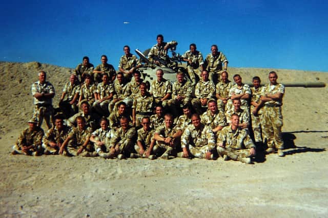 Iraq veteran Alex Daniels from Guiseley. Collect of Alex in Iraq. Pictured front row, second from the right. Picture Jonathan Gawthorpe