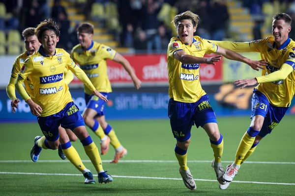 ABORTED MOVE - Sint-Truidense VV defender and recent Leeds United transfer target Daiki Hashioka celebrates after scoring a goal during a Belgian ProLeague first division football match against RWD Molenbeek. Pic: VIRGINIE LEFOUR/Belga/AFP via Getty Images