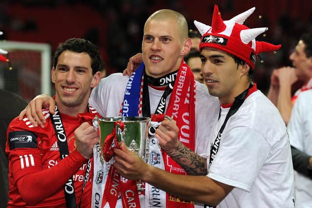 NEWELL'S OLD BOY - Maxi Rodriguez, pictured with Martin Skrtel and Luis Suarez after winning the Carling Cup with Liverpool, has made a pilgrimage to Leeds to be pictured beneath a Marcelo Bielsa Leeds United mural. Pic: Getty