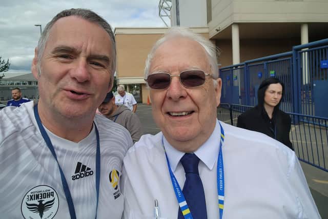 Leeds United super fan Paul Smith with the tour guide at Elland Road, David; who he said was 'hilarious'. Photo: Paul Smith