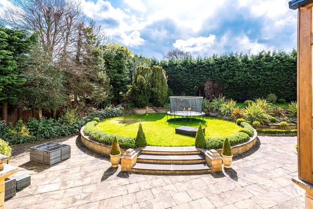 The gardens of this home lay predominately to the rear and have been carefully planned and landscaped with many mature plants, trees and hedges, ensuring a wonderful sense of privacy.