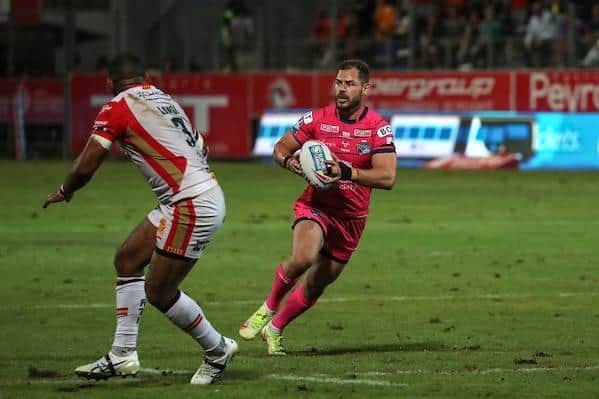 Aidan Sezer on the attack for Rhinos suring Friday's win at Catalans. Picture by Manuel Blondeau/SWpix.com.
