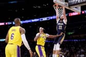 LEEDS INTEREST -  Larry Nance Jr of the New Orleans Pelicans dunks in front of Anthony Davis and LeBron James of the Los Angeles Lakers. The 6ft 8ins Pelicans man has taken an interest in Leeds United. Pic: Getty