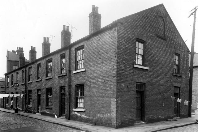 To the left is Cross Barstow Street then 5 Douglas Street pictured in June 1959. On the right two houses which are numbers 8 and 6 Church Cross Street. This property pre-dates 1890, when it is shown on McCorquedales map of Leeds.