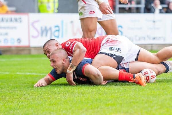 Mikey Lewis, the Hull KR stand-off, scores on his England debut against Tonga. Picture by Allan McKenzie/SWpix.com.
