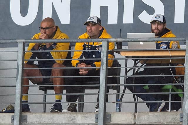 Rohan Smith, centre, watches as Leeds Rhinos slump to defeat at Hull FC. Picture by Bruce Rollinson.