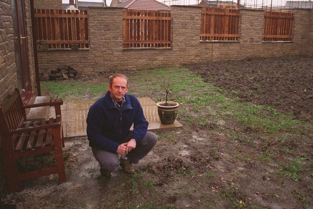 This is Driglington's Michael Pollard who paid nearly £3,000 to a company to flag his patio. Three months later pictured in January 1998 he was still waiting.