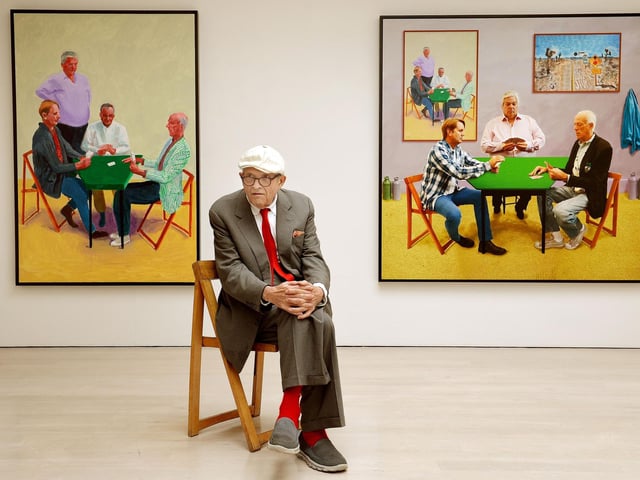 David Hockney sitting in front of his work entitled Card Players (left) and A Bigger Card Players at the launch of an Exhibition of his work called David Hockney: Painting And Photography at Annely Juda Fine Art in central London