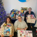 Total Travel at Ossett with donated toys for the Mission Christmas Toy Appeal.