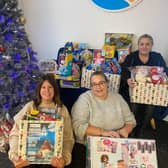 Total Travel at Ossett with donated toys for the Mission Christmas Toy Appeal.