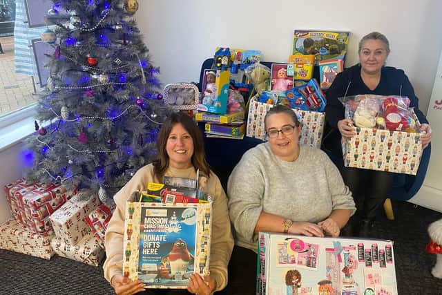 Total Travel at Ossett with donated toys for the Mission Christmas Toy Appeal.