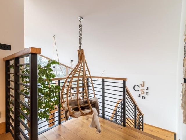 A hung chair provides a unique space in which to take a moment....
