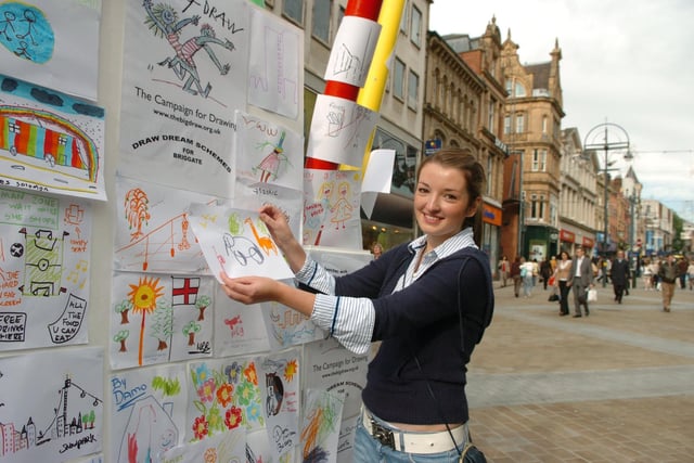 The Big Draw project, organised by Leeds Met architecture students, to ask the public to draw buildings of Briggate, in Leeds city centre. Pictured, student Dearbhail Keating with the public's ideas, in October, 2006.