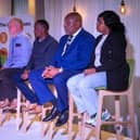 Former Unity Homes and Enterprise chief executive Ali Akbor OBE (left) addressing its Annual General Meeting, alongside Phil Cole, Jamal Tahlil, Patrick Bernard and Saskia Fishley