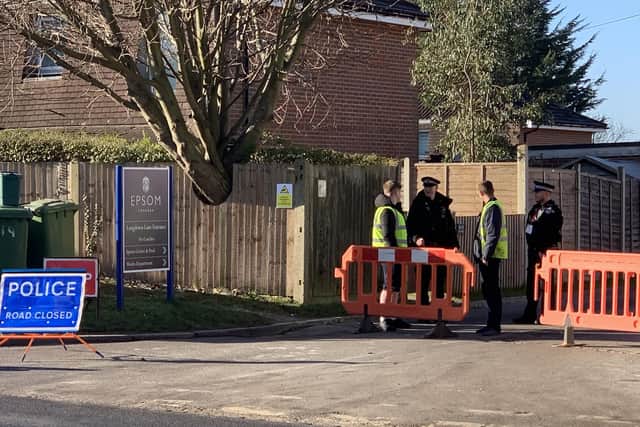 Police outside Epsom College in Surrey where the bodies of headmistress Emma Pattison, 45, her daughter Lettie, seven, and her husband George, 39, were found when officers were called to the private school by the South East Coast Ambulance Service at about 1.10am on Sunday morning.