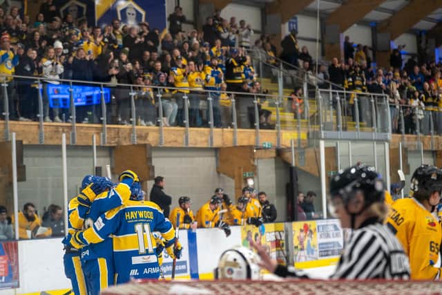 GOOD TIMES: Leeds Knights fans and players celebrate during last Saturday's 5-2 home win over Bees IHC. Picture courtesy of Oliver Portamento