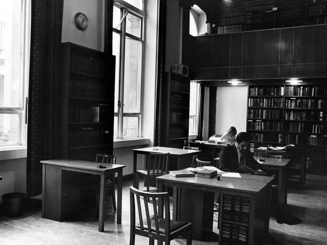 Law Library on the Calverley Street side of the Town Hall, overlooking the side entrance to the Central Library. Bookshelves line the walls with study desks and chairs situated in the centre. The Law Library was moved to the Combined Court on August 23, 1982.
