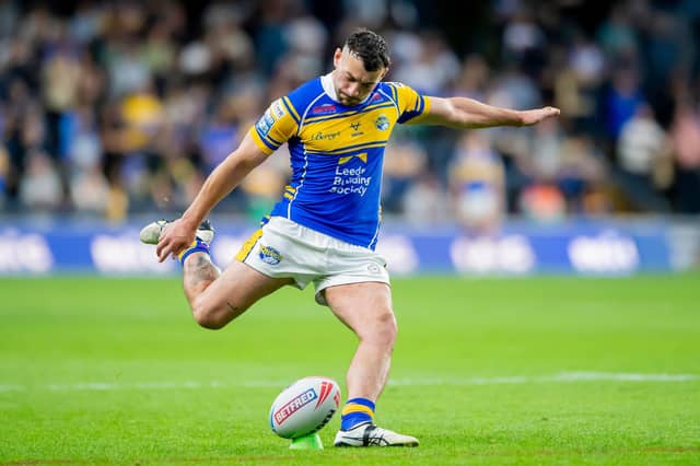 Jake Connor kicks one of his eight conversions - from as many attempts - during Leeds Rhinos' 48-30 win against Leigh Leopards. Picture by Allan McKenzie/SWpix.com.