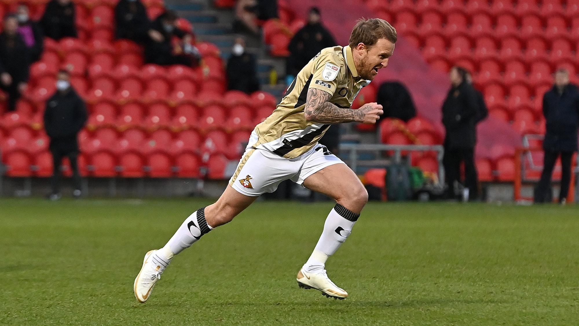 James Coppinger wheels away in celebration after scoring his injury time equaliser against Hull City. Picture: Andrew Roe/AHPIX