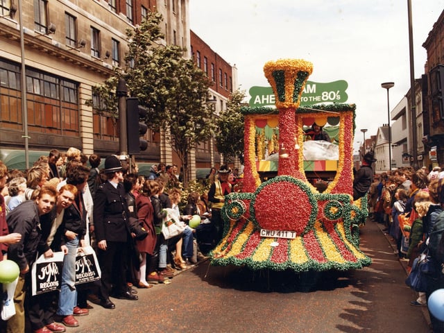 Lewis's decorated float as it 'steams' up The Headrow past Lewis's department store, seen left. 300,000 people turned out on the blustery, showery June day to watch the 7th Lord Mayor's Annual Parade wind it's way around the city centre.